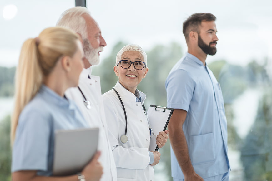 Diverse Medical Team Standing Together in Hospital