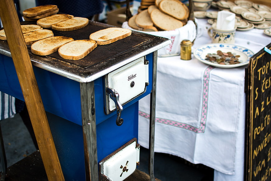 Traditional Czech garlic bread on vintage wood stove