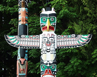Colorful Indigenous Totem Pole Sculpture In Stanley Park, Vancouver