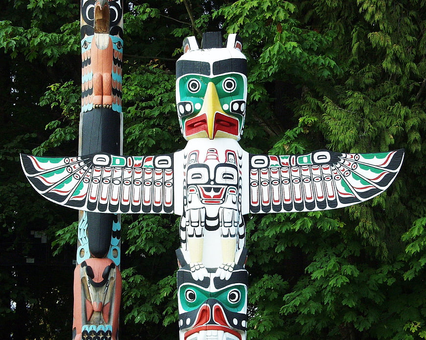 Colorful Indigenous Totem Pole Sculpture In Stanley Park, Vancouver
