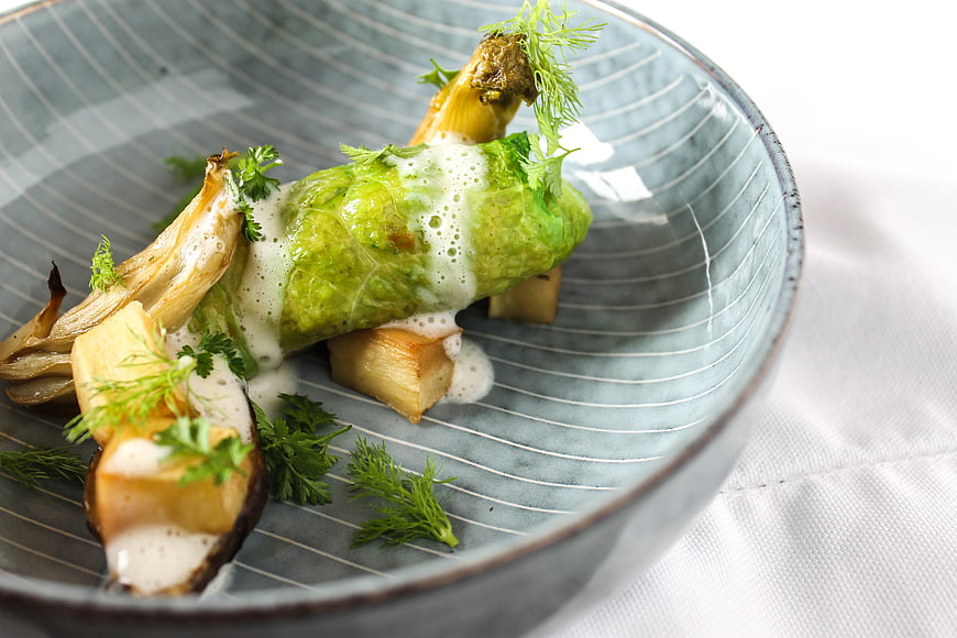 Gourmet Cabbage Roll with Roasted Vegetables and Creamy Sauce