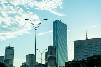 Modern City Skyline with Skyscrapers and Clouds
