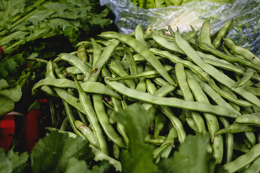 Fresh Green Beans Pile at Farmers Market