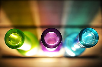 Top View of Colorful Glass Bottles with Shallow Depth of Field