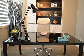 Modern Home Office with Black Desk and White Chair