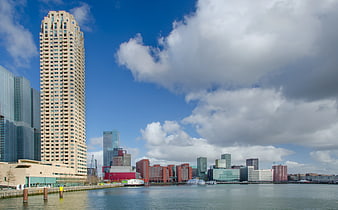 Modern City Skyline with High-Rise Buildings by the Water