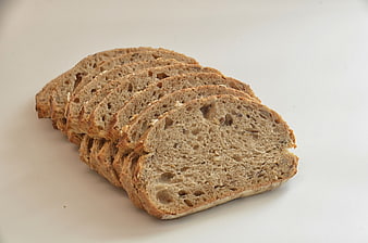 Sliced Whole Grain Bread on White Background