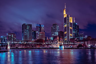 Frankfurt Skyline at Night with Main River Reflections and Bridge