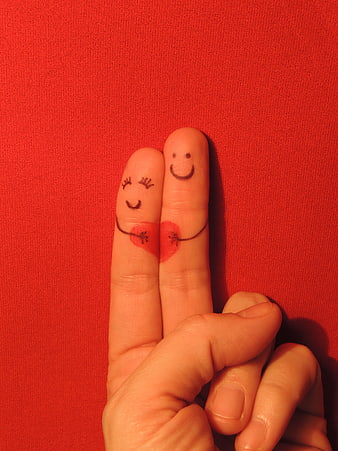 Creative Finger Couple Holding Hands on Red Background