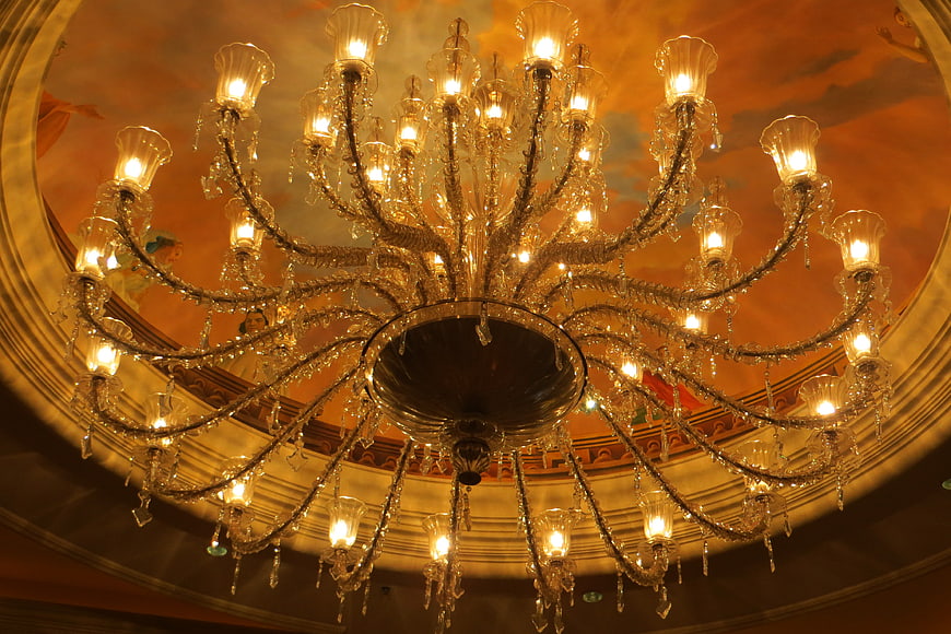 Grand Crystal Chandelier in Ornate Ceiling Dome