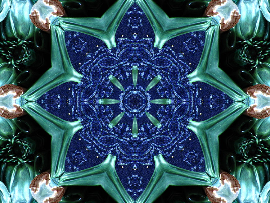 Abstract blue and green kaleidoscope star pattern design