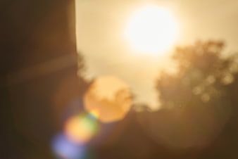 Abstract Golden Sunlight Bokeh with Lens Flare