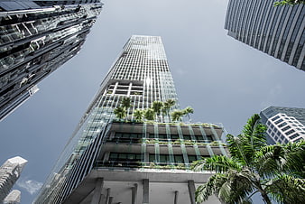 Low angle view of modern skyscraper with sky garden