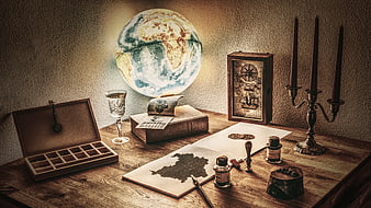 Vintage explorer desk with glowing globe and antique map