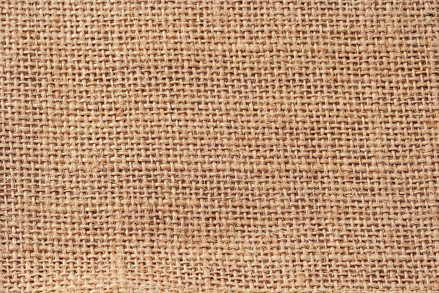 Close-up texture of woven burlap fabric background