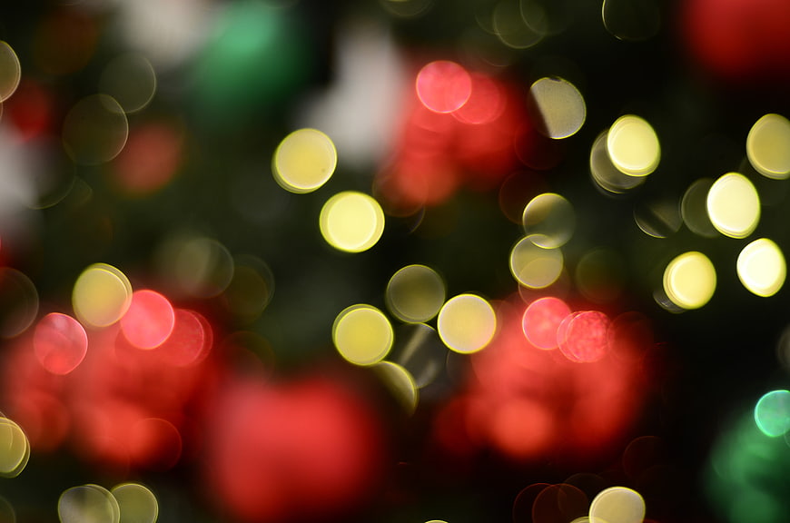 Abstract Christmas Bokeh Background with Red and Gold Lights