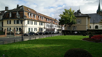 Historic European Town Square with Park and Church