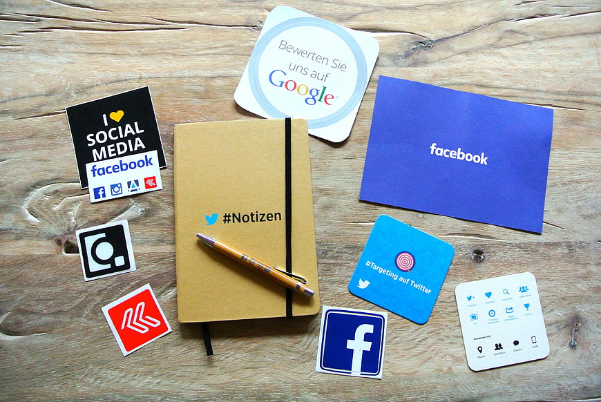 Social Media Marketing Strategy Flat Lay on Wooden Table