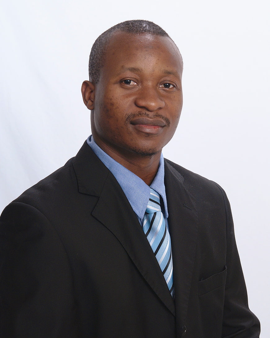 Professional African Businessman Portrait In Suit And Tie