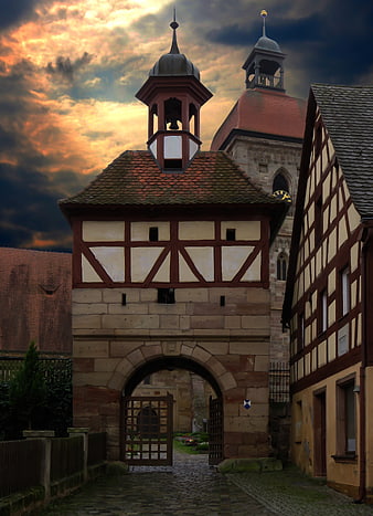 Historic Half-Timbered Gate Tower in Medieval German Town