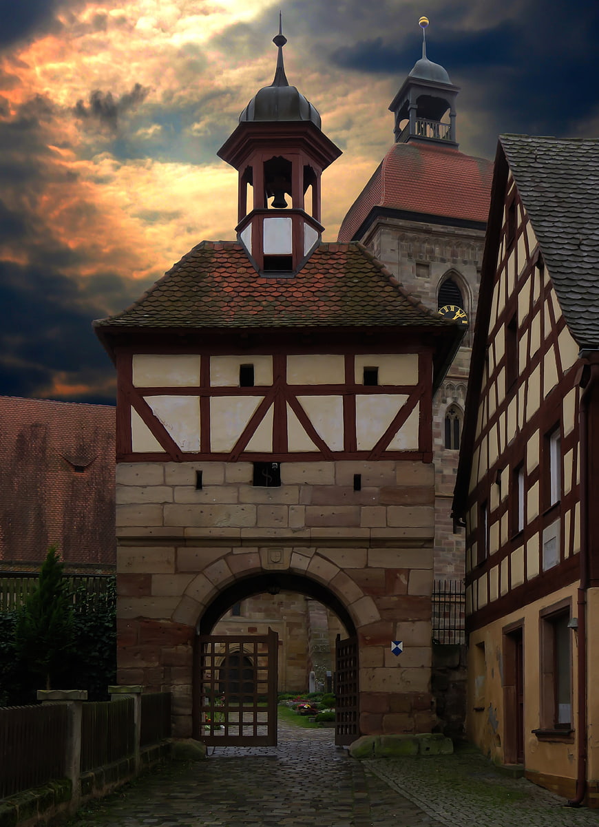 Historic Half-Timbered Gate Tower in Medieval German Town