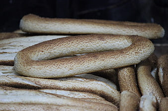 Traditional Sesame Bread Loaves Stacked in a Bakery