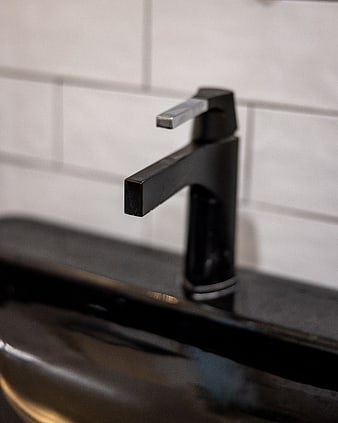 Modern Black Faucet on Dark Stone Sink