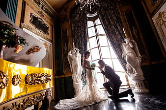 Romantic Wedding Couple Kissing in Luxurious Baroque Palace Interior
