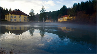 Misty Winter Morning at Chateau de Droiteval with Frozen Lake Reflections