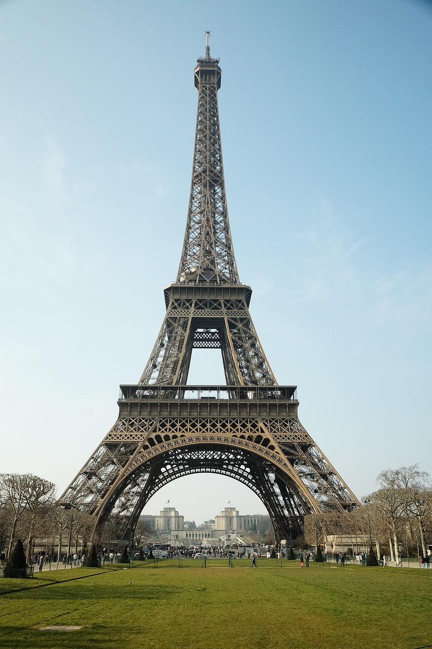 Full View of Eiffel Tower in Paris with Green Lawn