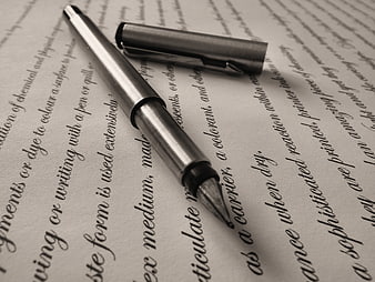 Silver fountain pen on vintage text paper
