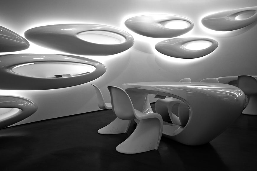 Futuristic White Interior with Curved Furniture and Lighting