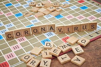 Coronavirus Word Spelled on Scrabble Board Game