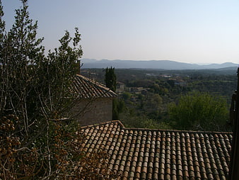 Terracotta roof tiles overlooking Cevennes valley landscape