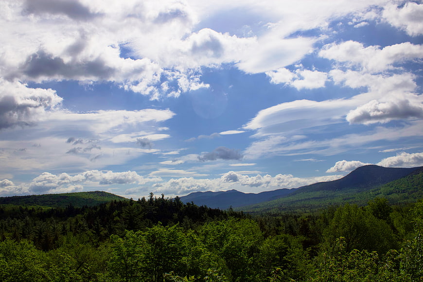 Scenic Mountain Landscape with Blue Sky and Clouds