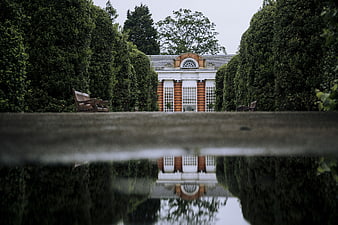 Symmetrical Garden Pavilion Reflected in Water
