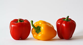Three Bell Peppers on White Background