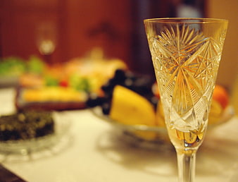 Crystal Champagne Flute with Blurred Appetizers