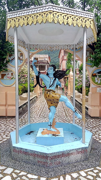 Blue Lord Shiva Statue Dancing in Temple Pavilion