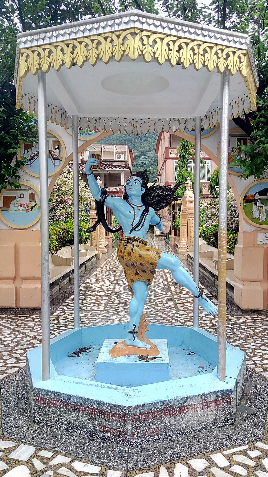 Blue Lord Shiva Statue Dancing in Temple Pavilion