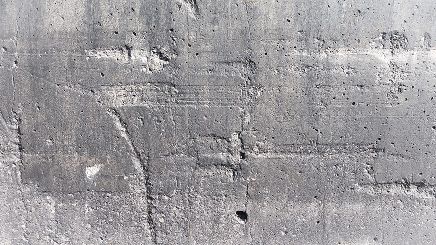 Gray Concrete Wall Texture with Cracks and Imperfections