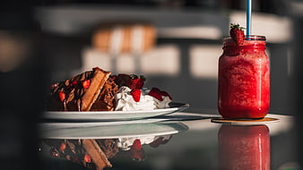 Chocolate Waffle and Strawberry Smoothie on Glass Table