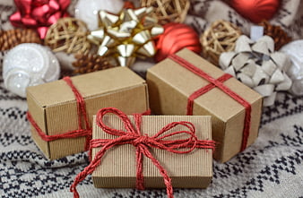 Rustic Christmas Gifts Wrapped in Kraft Paper with Red Twine
