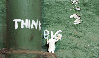 Miniature Painter Figurine Writing Think Big on Green Wall