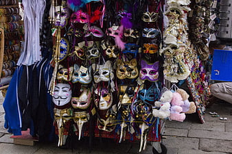 Colorful Venetian Masks Displayed at a Street Market Stall