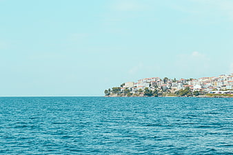 Coastal town skyline on a sunny blue sea day