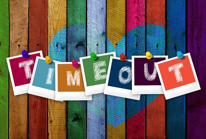 Colorful Time Out Concept With Polaroid Cards On Wooden Background