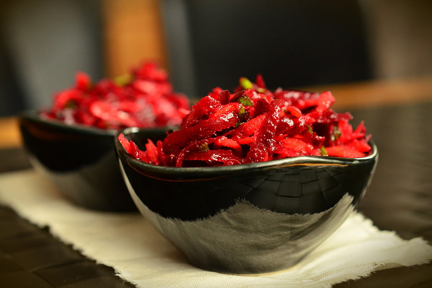 Vibrant Beetroot Salad in Black Ceramic Bowls