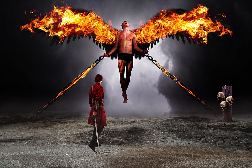 Fallen angel with fiery wings chained by warrior