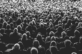 Black and white crowd of spectators in stadium
